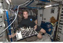 Gregory Chamitoff playing chess on board the International Space Station.